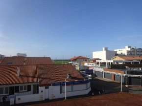 Appart 2ème étage avec balcon et place de parking